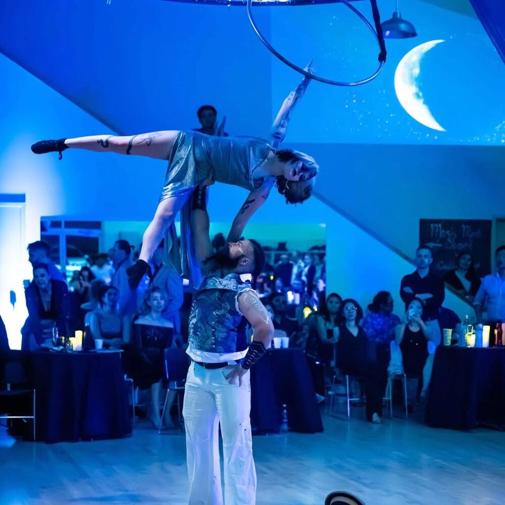 Dance acrobatics under a crescent moon
