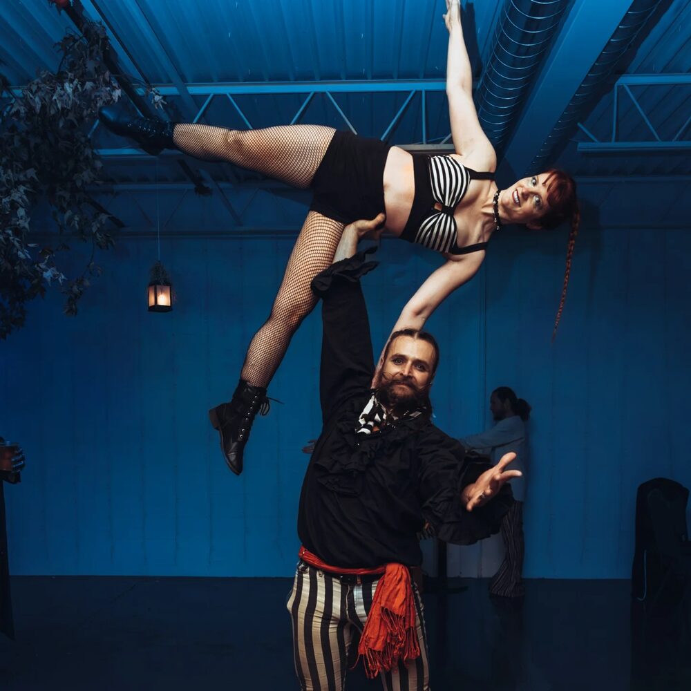 Acrobatic lift at Carnival Noir