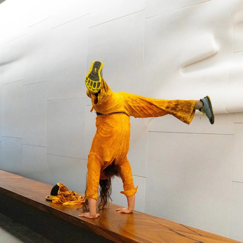 Handstand in marigold