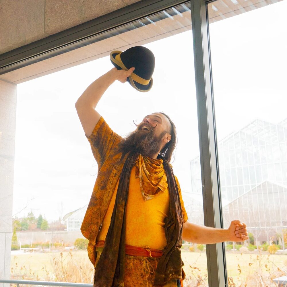 Scott tossing a bowler hat