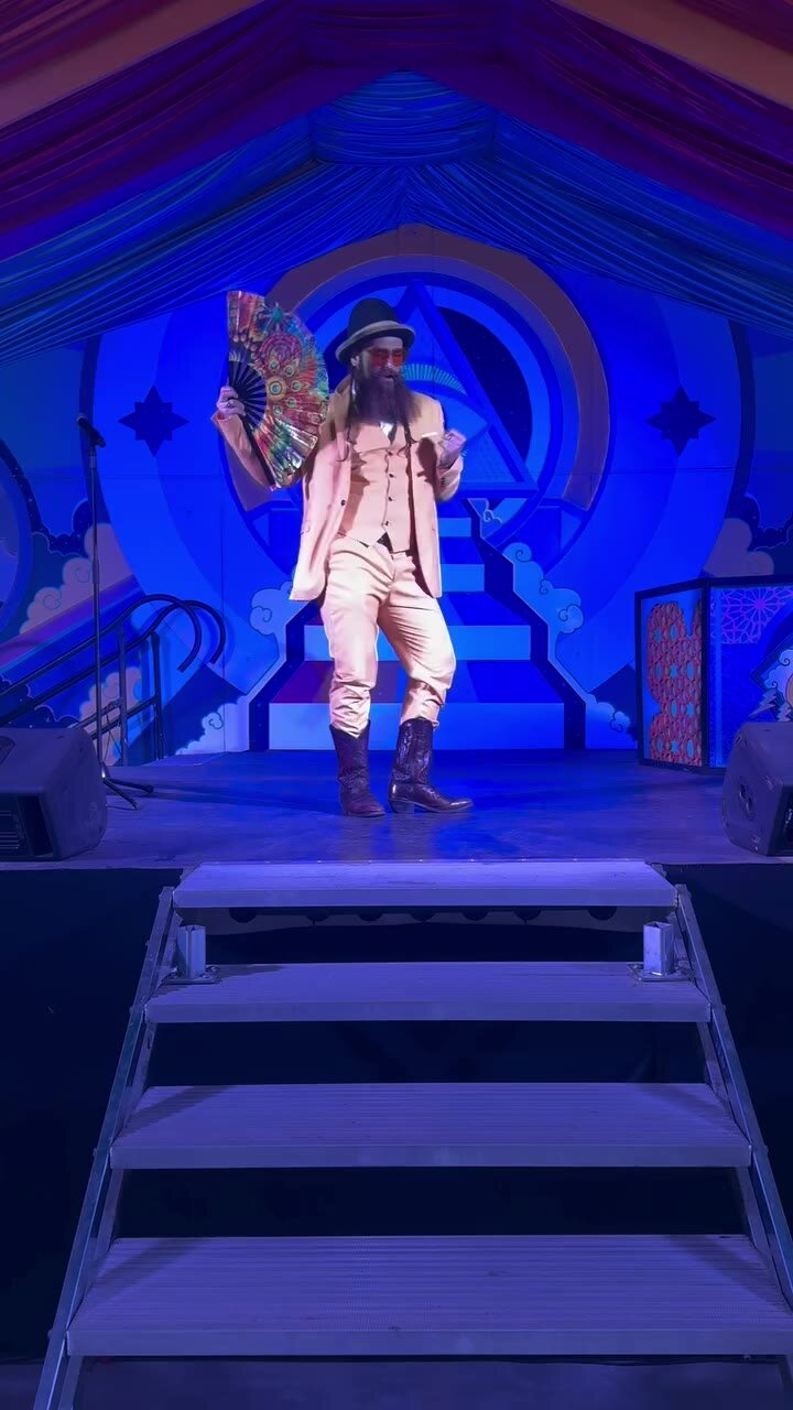 Fan manipulation on stage at Electric Forest